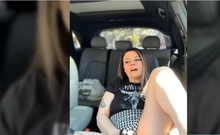 Masturbating in her car with vibrator plus dildo