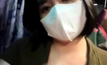 Teen on the bus hinting at showing breasts and being sensual